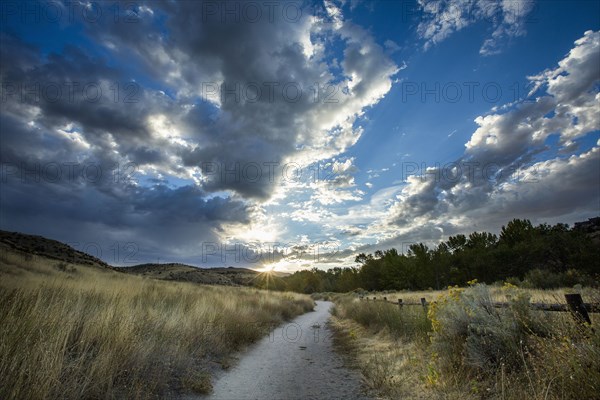 Sunset over distant path