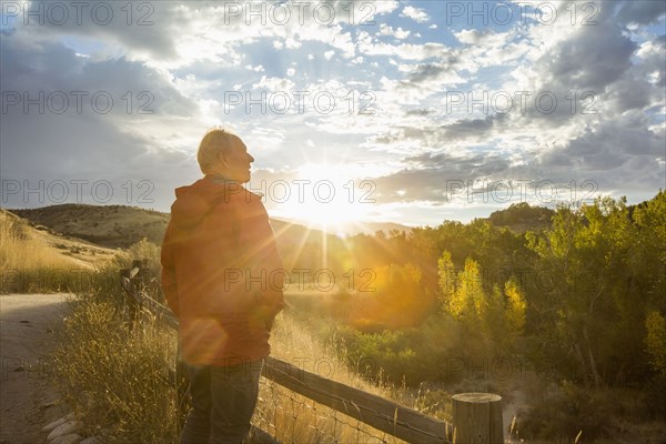 Caucasian man admiring sunset