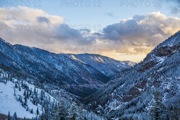 Snow in valley at sunset