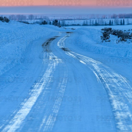 Ice on winding road in winter