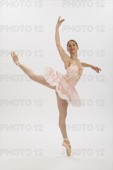 Caucasian woman ballet dancing