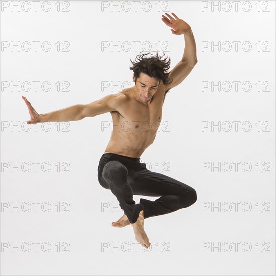 Mixed Race man ballet dancing