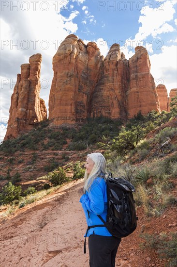 Caucasian woman hiking in desert landscape