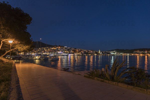 Scenic view of waterfront at night