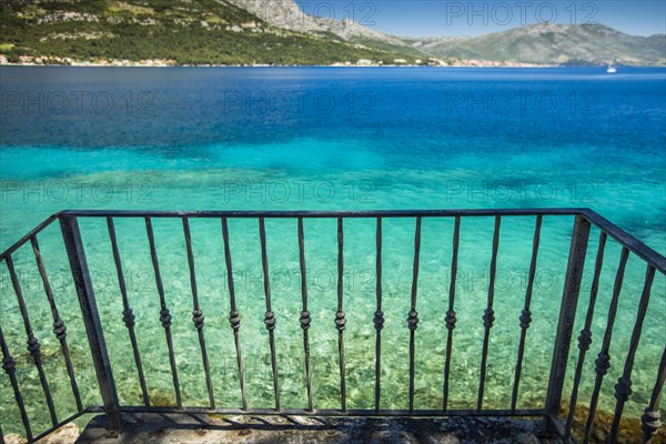 Balcony overlooking tranquil ocean