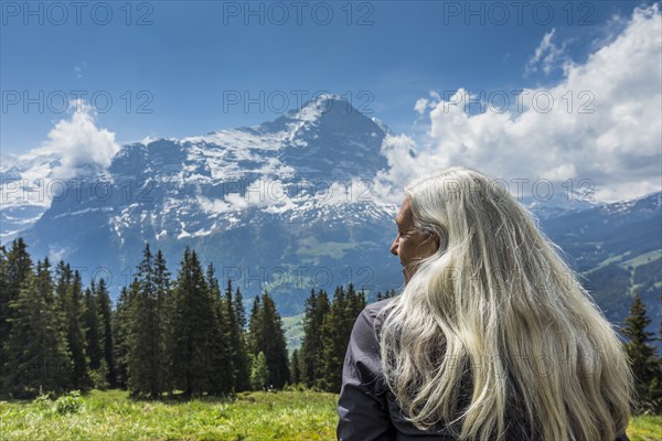 Caucasian woman admiring scenic view of mountain