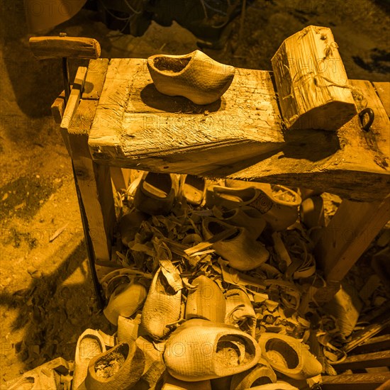 Wooden clogs near workbench