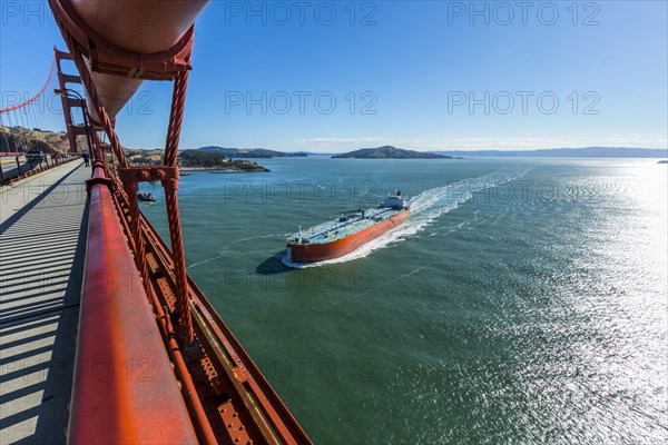 Bridge over boat in bay