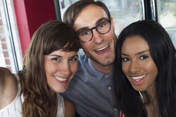 Smiling friends posing