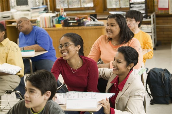 School teacher and students in classroom