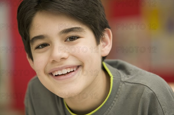 Portrait of Hispanic boy smiling