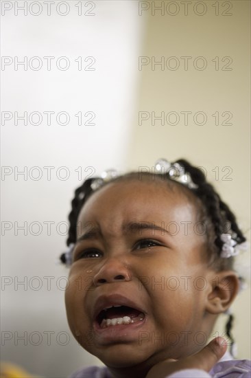 African girl crying