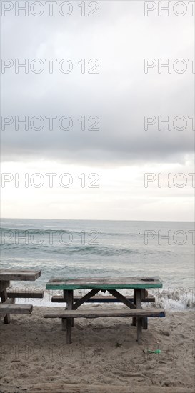 Picnic tables near ocean