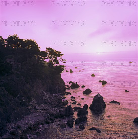 Ocean and cliffs at sunset