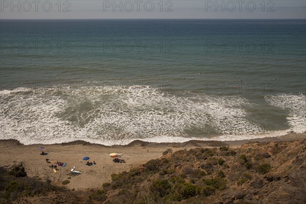 High angle view of ocean waves on beach