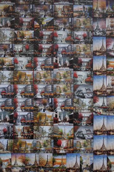 Collage of souvenir postcards on gift shop wall