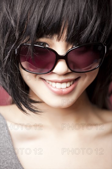 Chinese woman wearing sunglasses