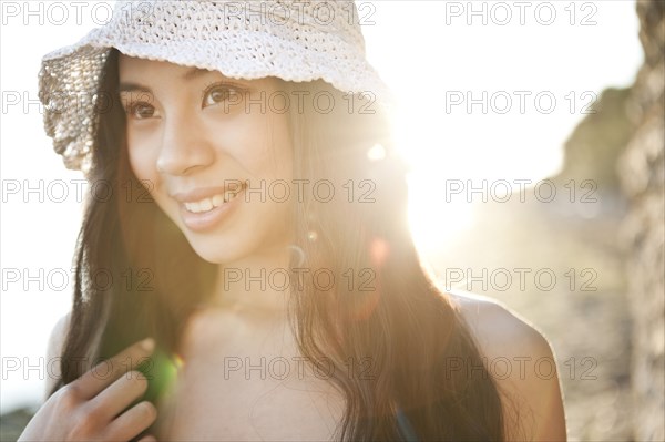 Smiling Chinese woman in hat