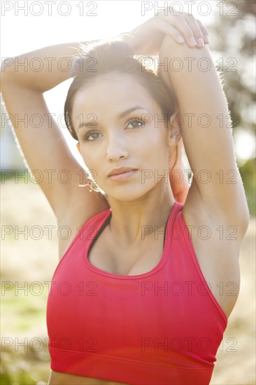 Woman warming up before exercise