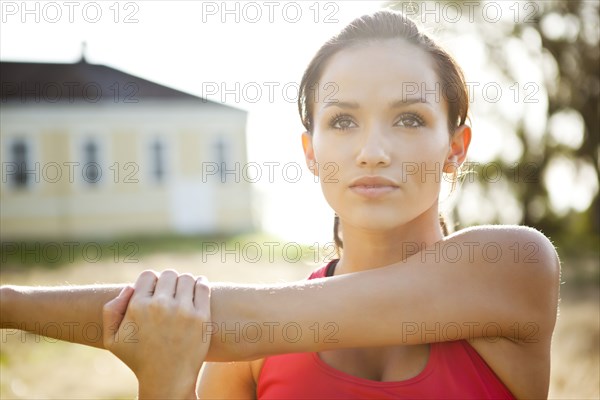 Woman warming up before exercise