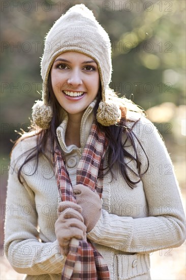 Mixed race woman in cap