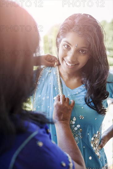 Indian mother and daughter in traditional clothing