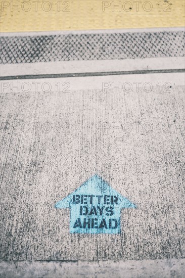 Better days ahead spray painted on concrete