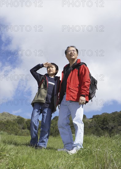 Asian father and son outdoors