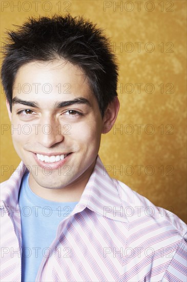 Close up of Hispanic man smiling