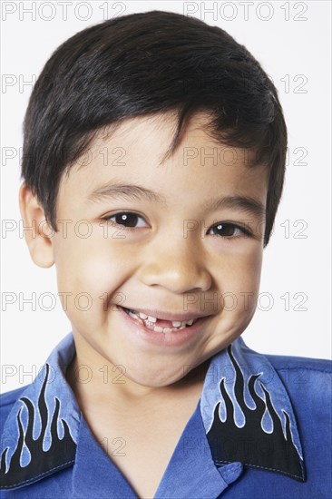 Close up of young boy smiling