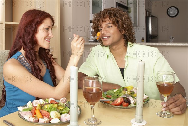 Multi-ethnic couple at restaurant