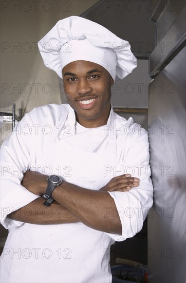 African American male chef with arms crossed