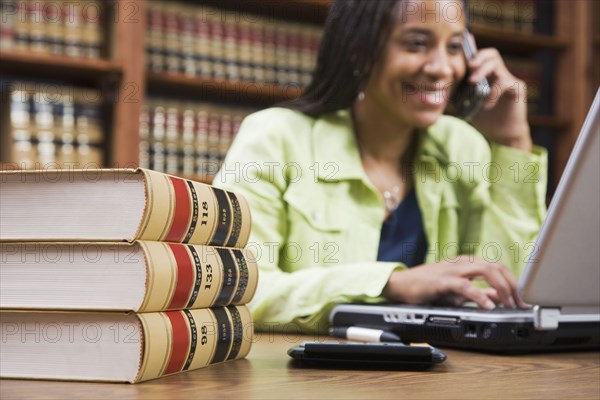 African American woman talking on cell phone