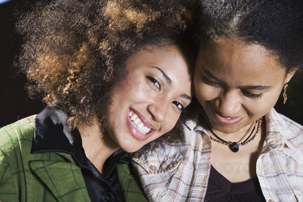 African sisters hugging