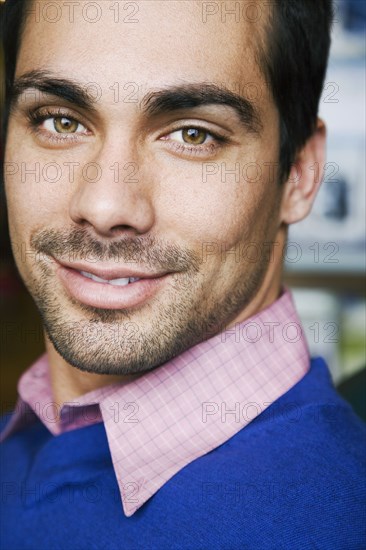 Close up of Pacific Islander man smiling