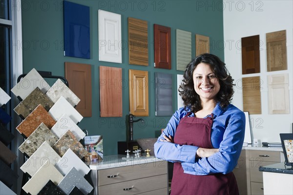 Hispanic sales clerk in home decor store