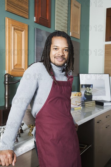 African sales clerk in home decor store