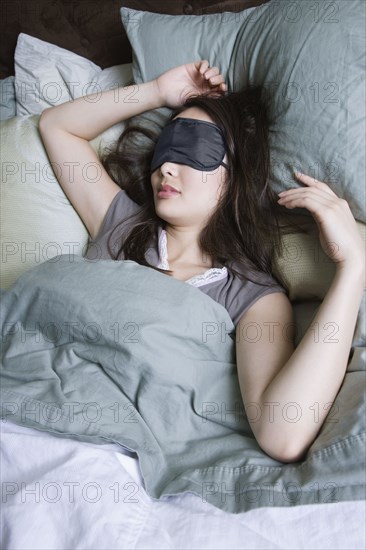 Woman sleeping with eye mask