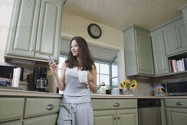Woman drinking coffee in morning