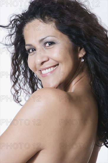 Portrait of nude mixed race woman