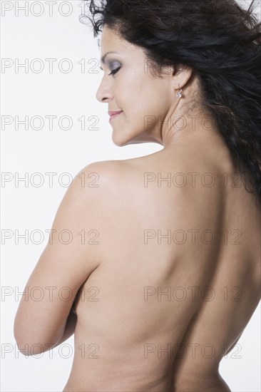 Portrait of nude mixed race woman
