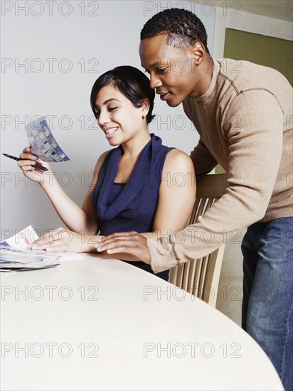 Couple viewing coupons together