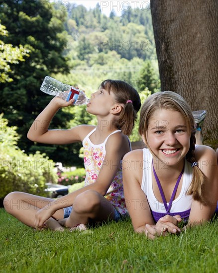 Caucasian girls relaxing in park