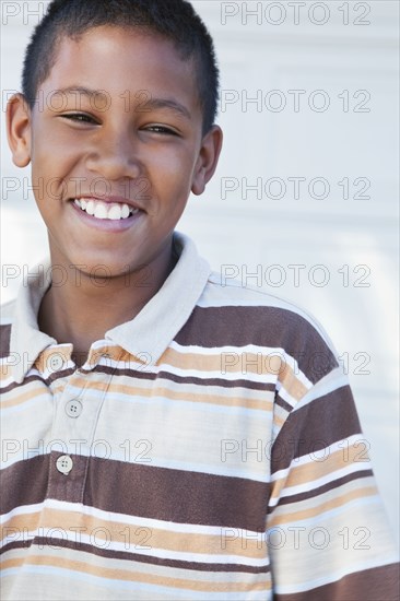 Smiling mixed race boy