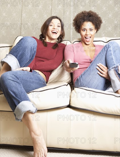 Women watching television together
