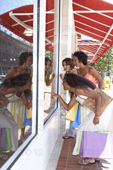 Women shopping together on city street