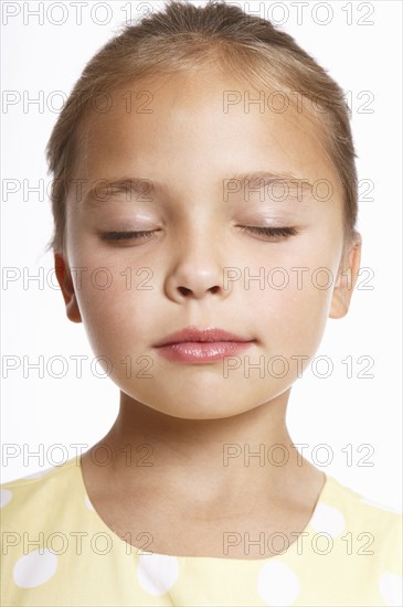 Caucasian girl with eyes closed