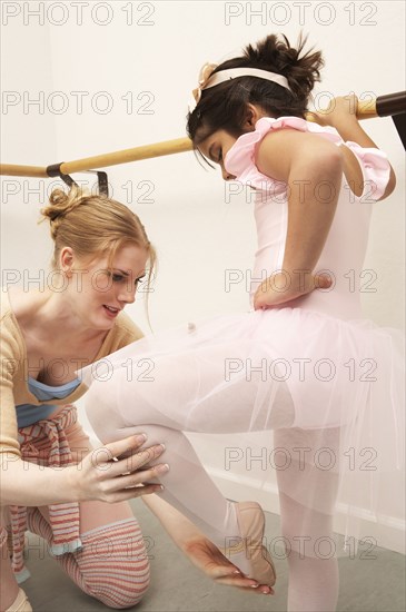 Girl working with ballet teacher