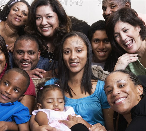 Multi-generation family smiling together