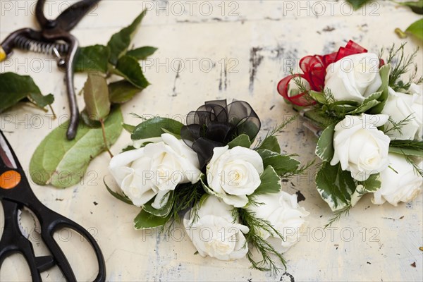 Flower arrangements on work table in florist